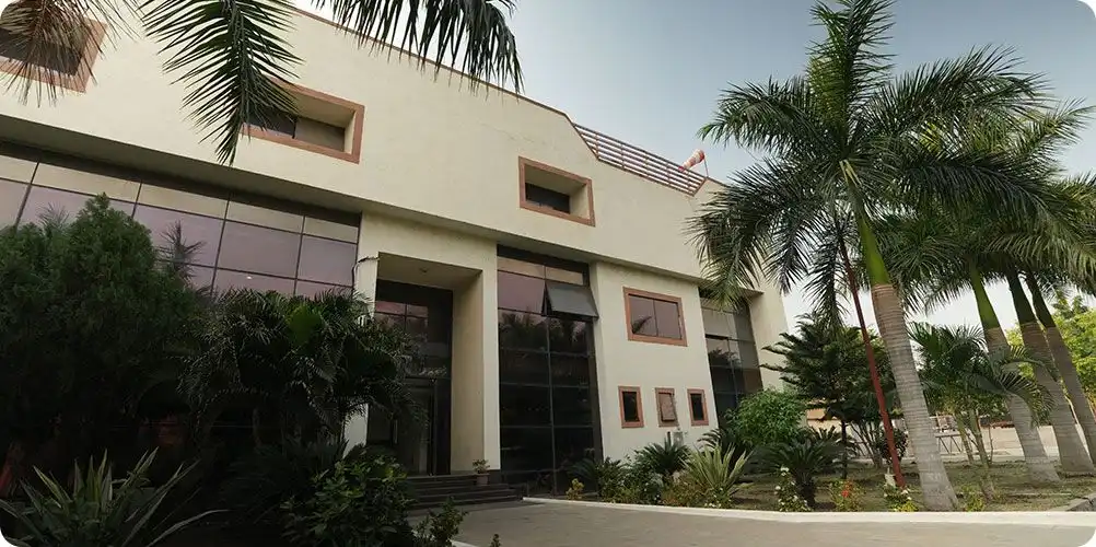 Industrial manufacturing plant with factory buildings and warehouses.