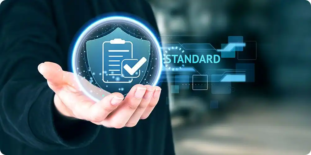 Safety standards image with workers wearing helmets and safety gear in an industrial setting, representing workplace safety.