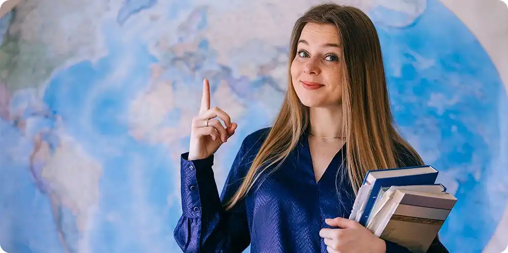 Woman working in front of a computer representing international assignments or remote work opportunities.