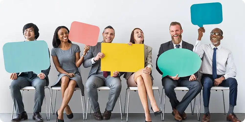 Group of young professionals or students symbolizing current job openings or collaborative work environment.