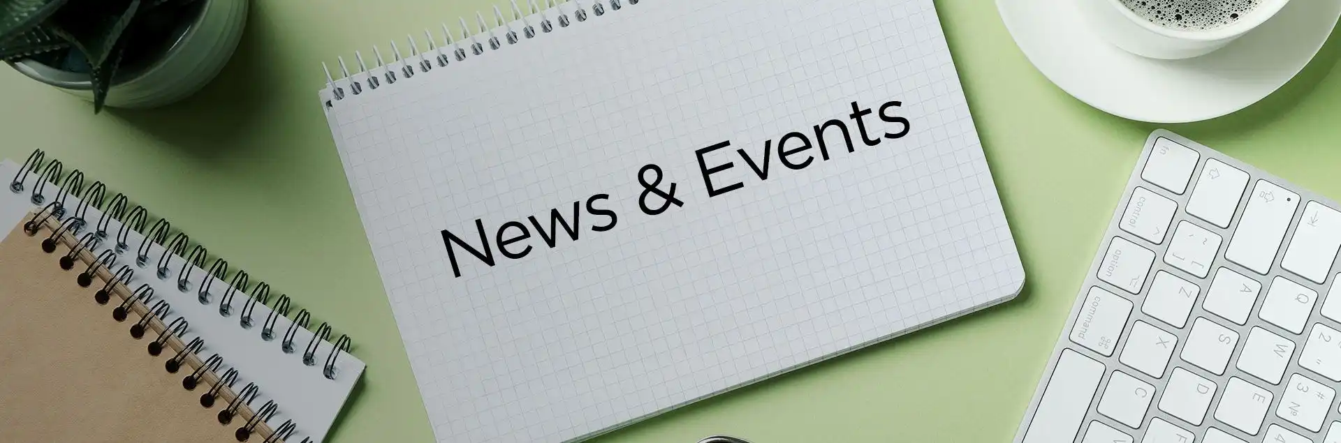 News and events banner showing a professional woman with digital news graphics overlaid, symbolizing corporate communication and updates.