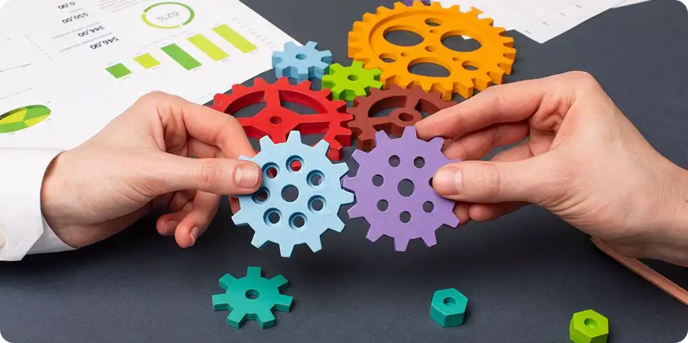 Grievance handling mechanism image showing a diverse group discussion with a facilitator, symbolizing a transparent complaints process.